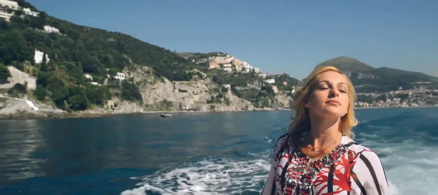 Frame 3 from the video: the Campania coast seen from the boat