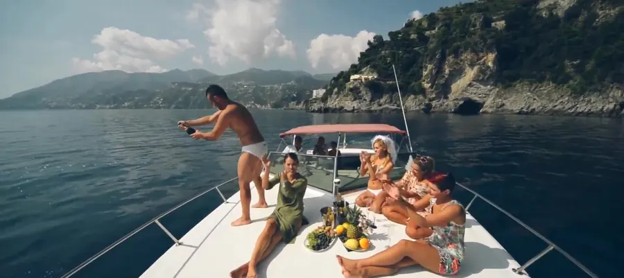 Frame 11 from the video: the Campania coast seen from the boat